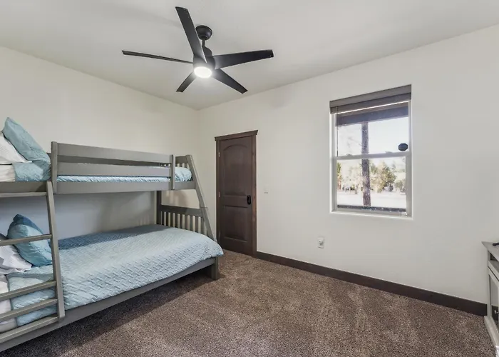 Holiday home Scenic Golf Retreat With Modern Comforts & Fireplace Townhouse